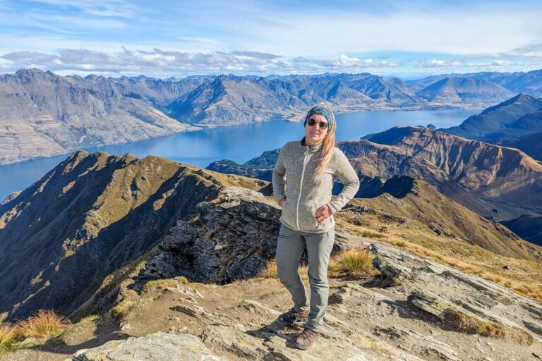 Bailey at the summit of Ben lomond in Queenstown looking towards Glenorchy