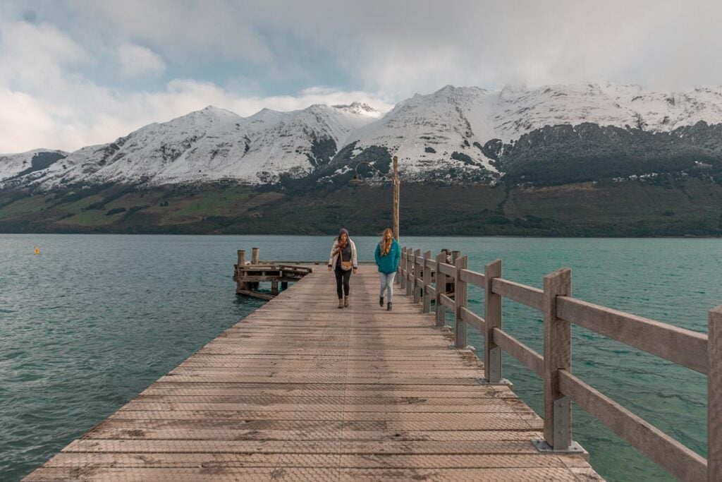 Two ladies walk the Glenorchy Jetty
