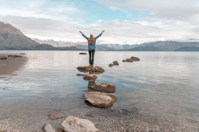 Walking on rocks in Lake Wanaka