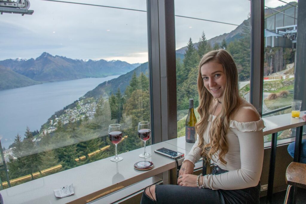 Bailey from My Queenstown Diary enjoying a drink t the Stratosfare Bar at the top of the Tiki Trail