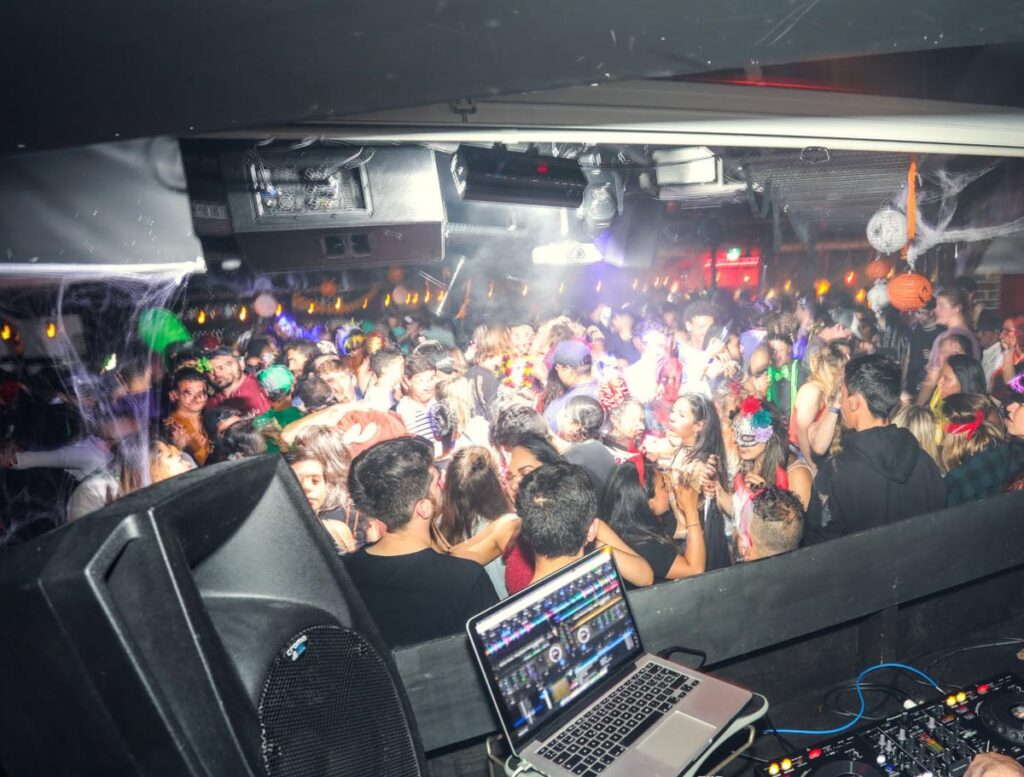 A pack dance floor at The London Queenstown