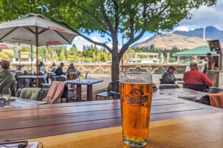 A craft beer on a table in Queenstown waterfront
