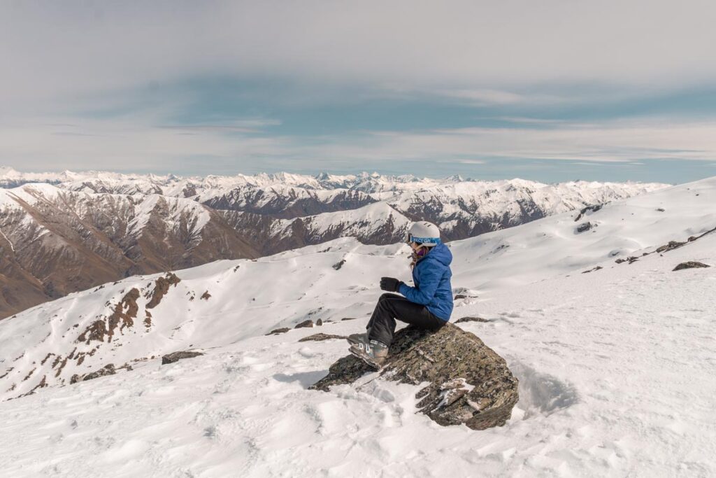 Sitting at the top of Cardrona Ski Resort looking out at the views
