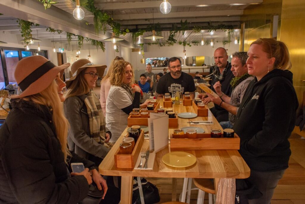 Enjoying craft beer and food at Canyon Brewing in Queenstown