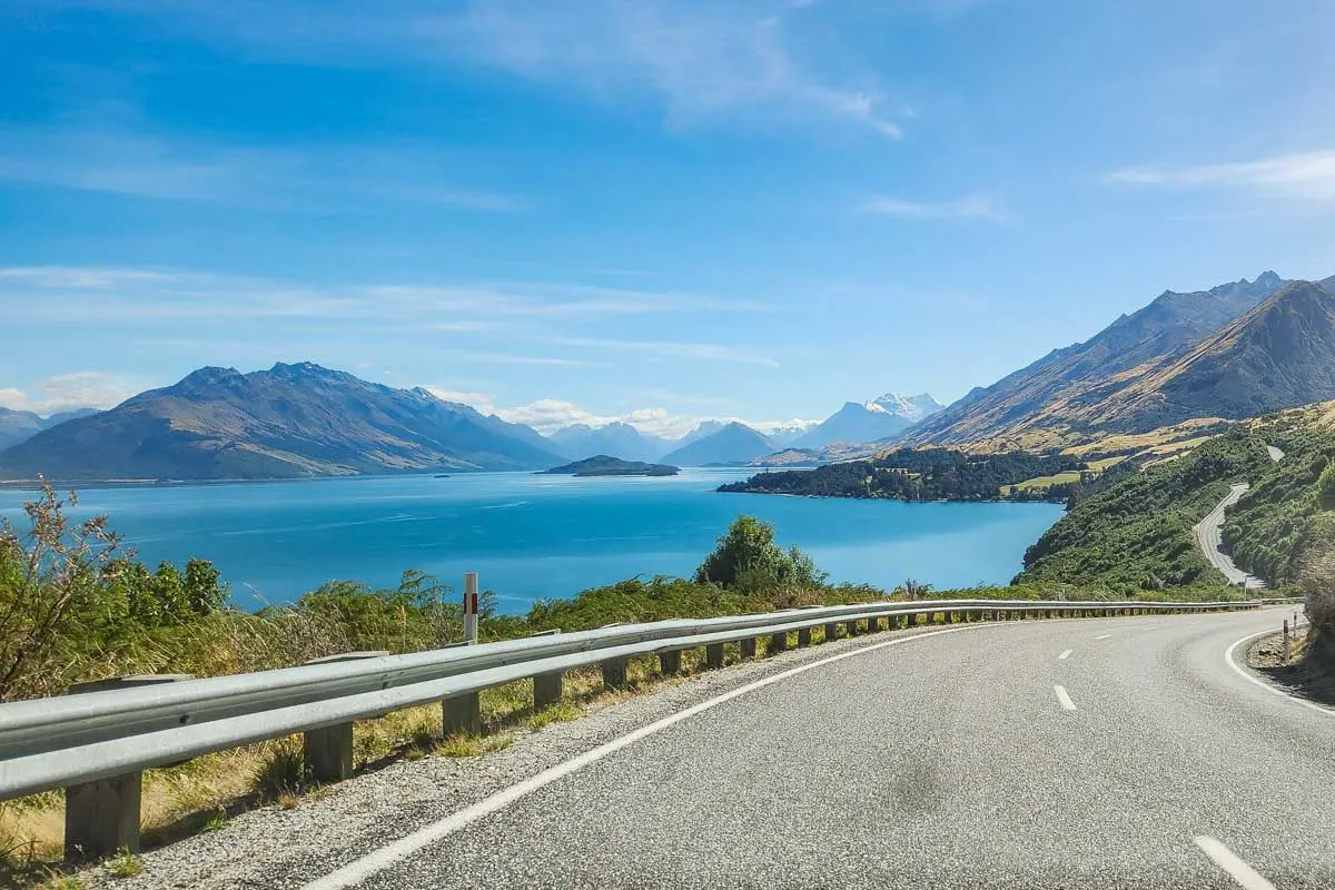 Windy road with mountain and lake views on the way to Glenorchy from Queenstown