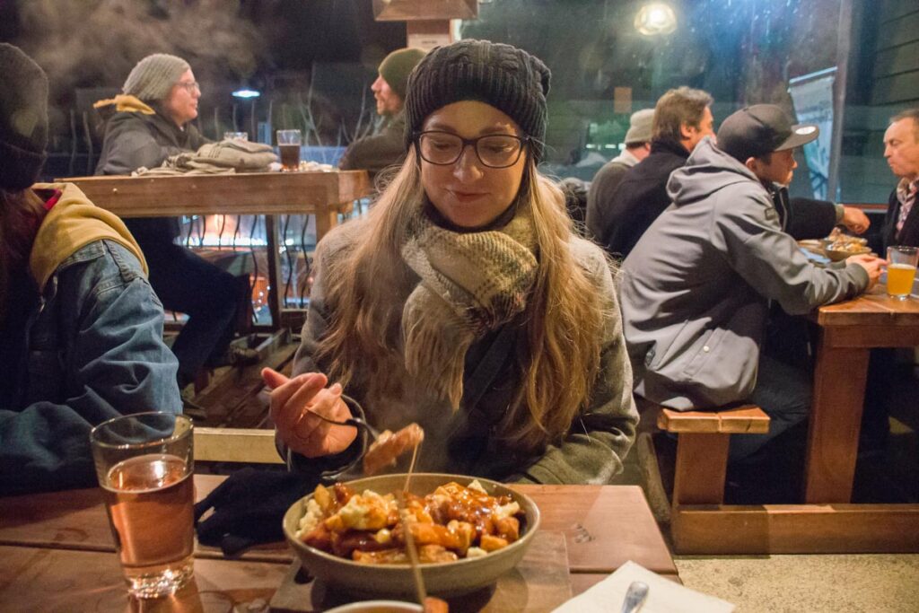 Eating poutine at Smiths Queenstown