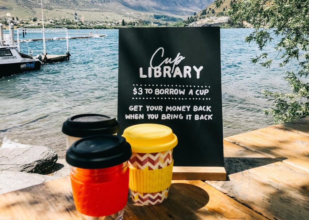 Two coffees by the water at The Boatshed in Queenstown
