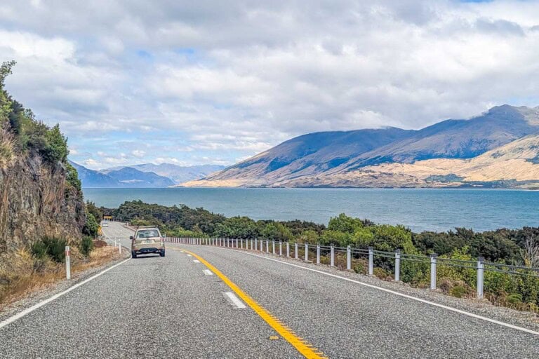 Road winds its way along Lake Wanaka between Franz Josef and Queenstown