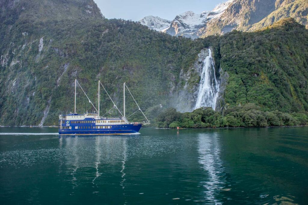 A cruise floats through Milford Sound