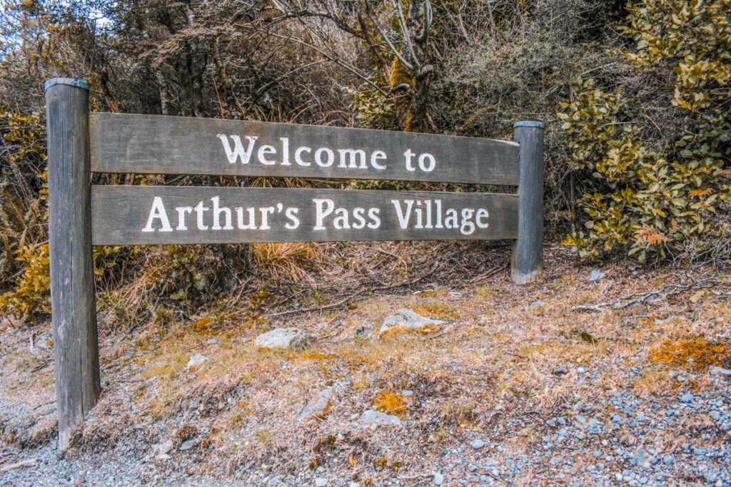 Sign welcoming people to Arthurs Pass Village
