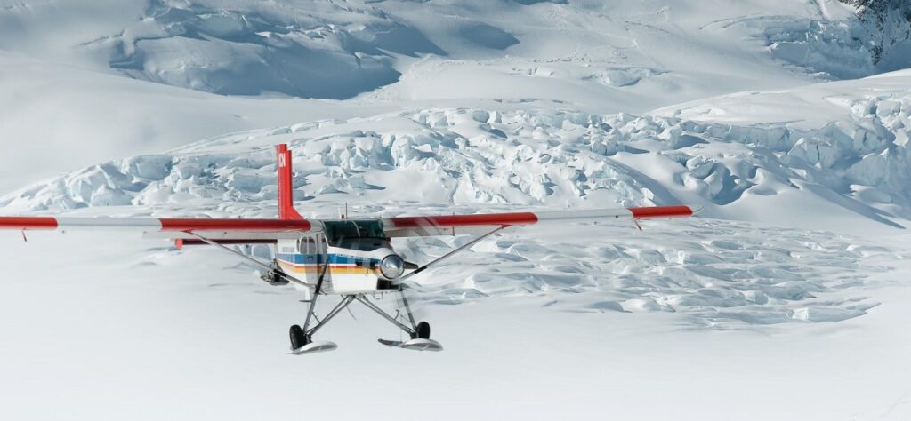 a ski plane landing in snow in Mount Cook National Park