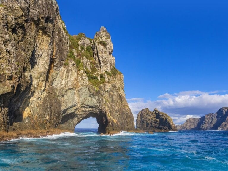 view of the famous Hole in the Rock near Paihia
