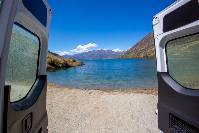 View of Lake Wanaka from a campervan in New Zealand