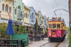 A tram travels down New Regent Street in Christchurch, New Zealand