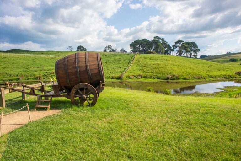 Green fields and a beer barrel at Hobbiton, New Zealand