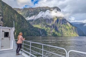 Bailey looks out from the deck of a cruise in Milford Sound and enjoys the view