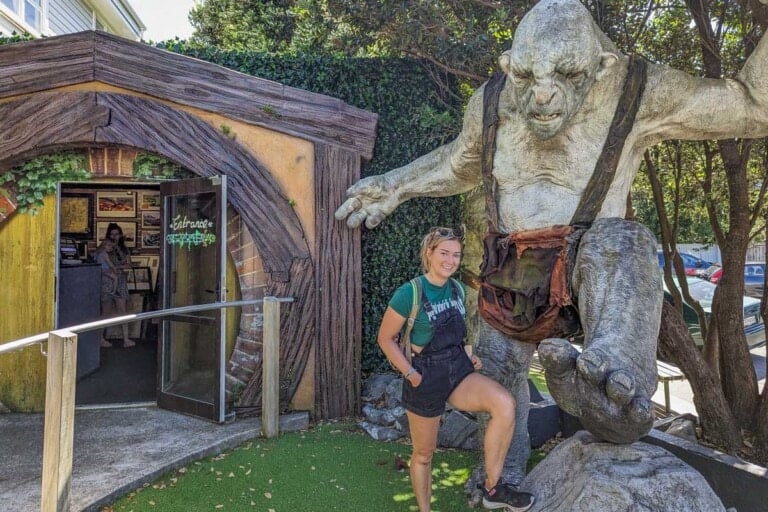 Bailey with the troll out the front of the Wētā Workshop and Cave in Wellington