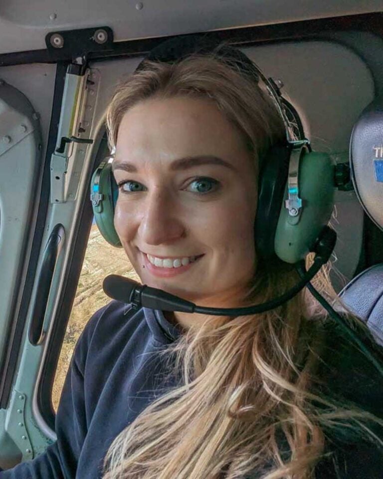 Bailey-poses-for-a-photo-in-a-helicopter-ride-over Mount Cook New Zealand
