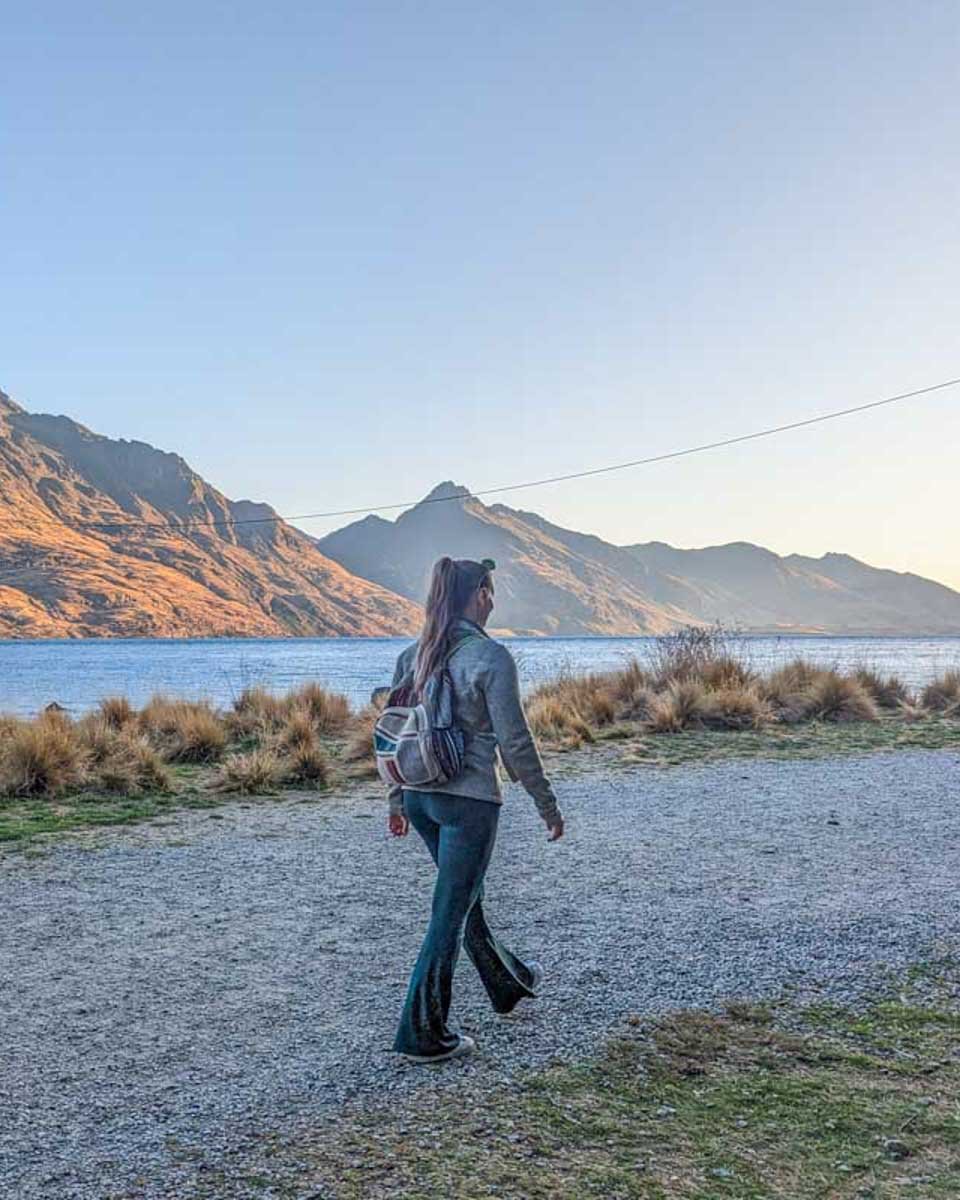 Bailey-walks-along-the-edge-of-the-Queenstown-Gardens-at-sunset