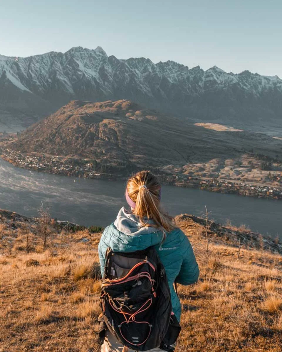 Bailey at the top of Queenstown Hill at sunset in Queenstown New Zealand
