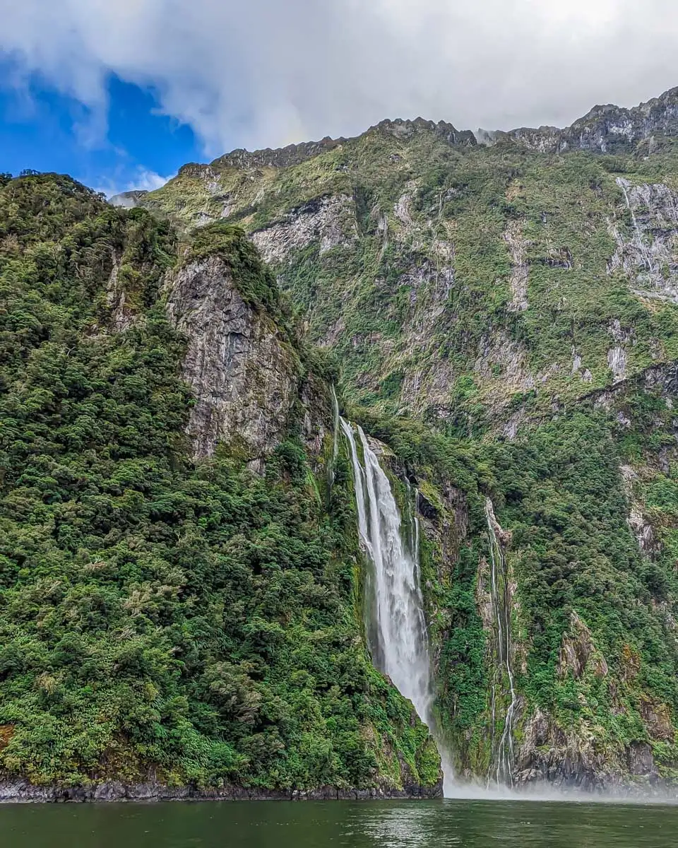 Our-boat-aproaches-Stirling-Falls-in-Milford-Sound-NZ on a tour from Queenstown