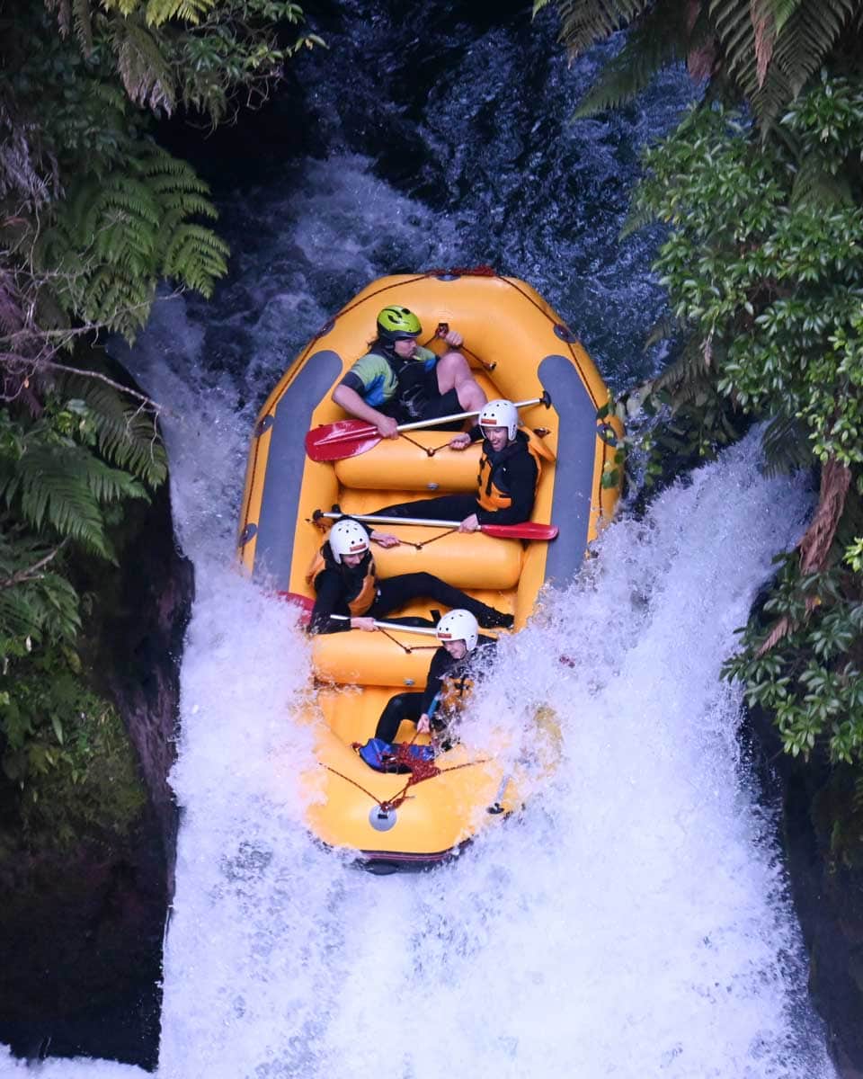 A raft goes down a waterfall on the Kaituna River in Rotorua