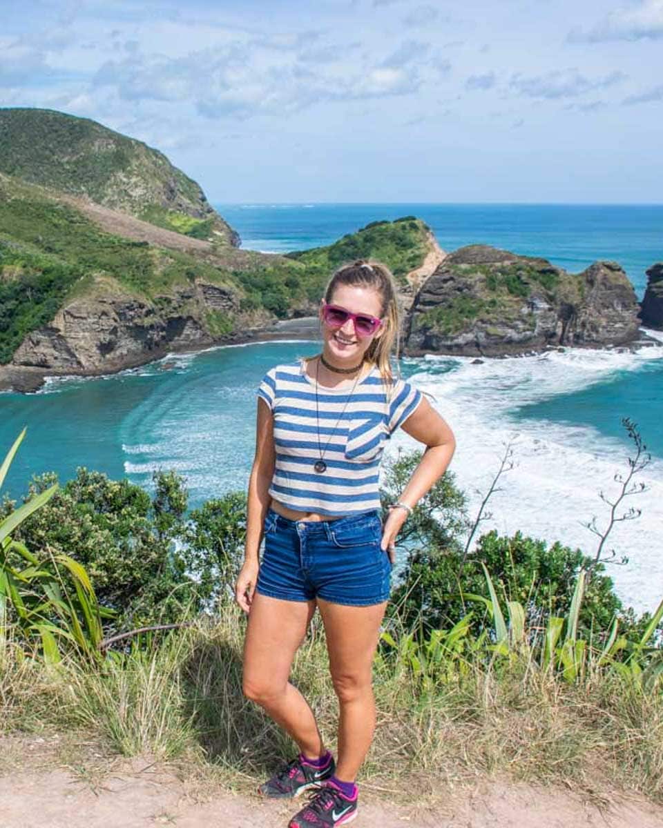Bailey-poses-for-a-photo-at-Piha-Beach-New-Zealand