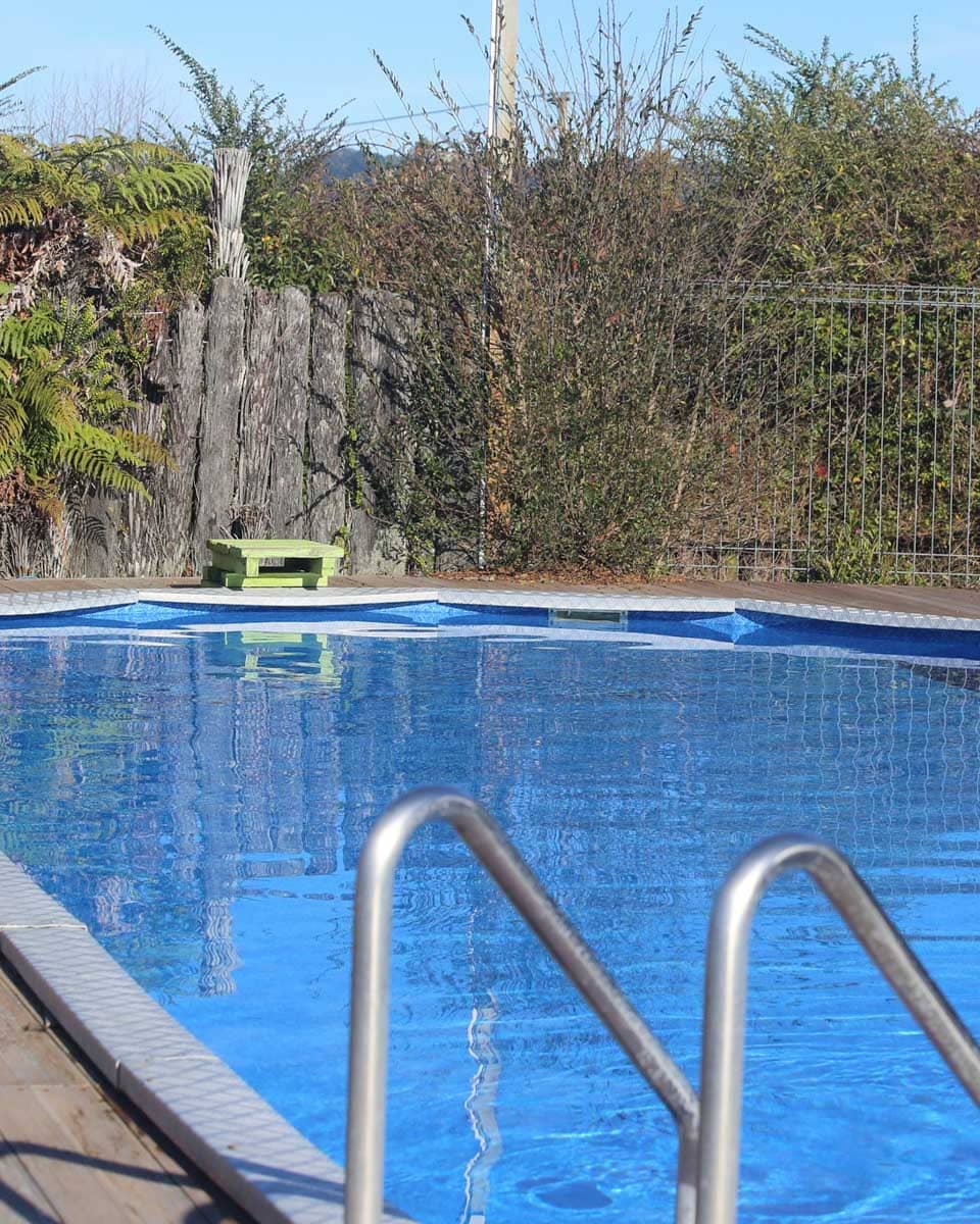 Outdoor pool at Cosy Cottage Thermal Holiday Park Rotorua
