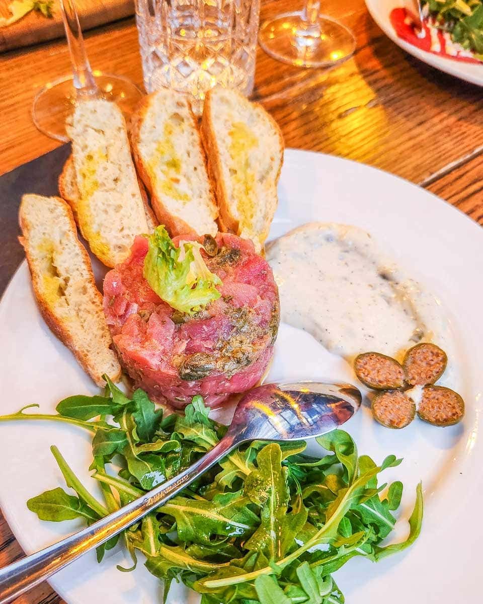 Enjoying-a-starter-to-share-with-the-group-on-a-wine-tour-in-Tauranga New Zealand