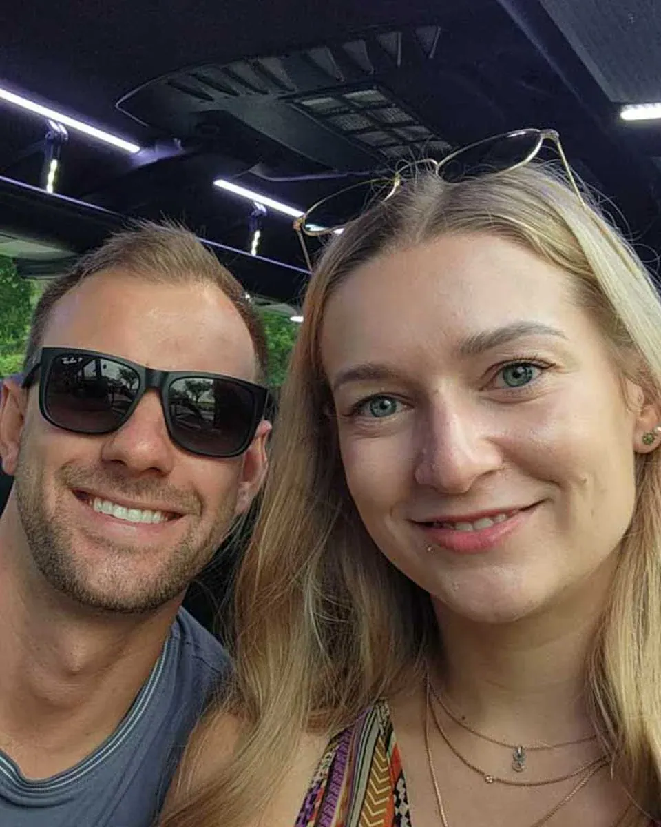 Daniel-and-Bailey-take-a-selfie-while-on-a-bus-during-a-tour-on Waiheke Island, New Zealand