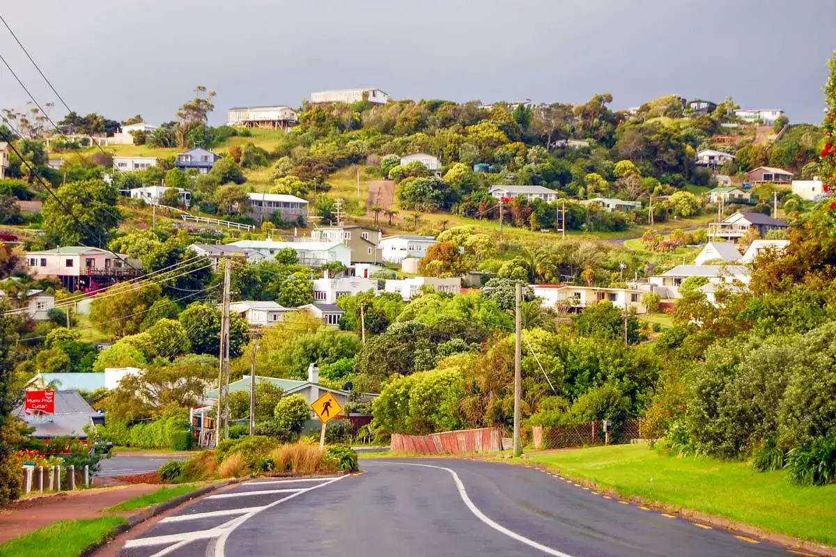 Road passing through a town on Waiheke Island, New Zealand
